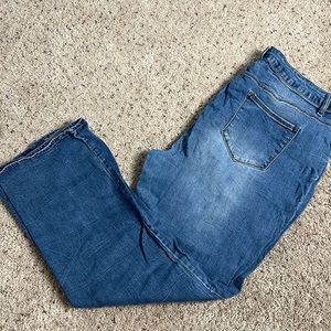 Distressed blue jeans